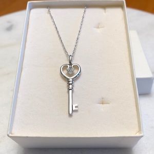 Sterling silver key necklace with diamond dust
